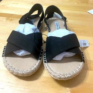 Size 9. Torrid black lace up Sandals.